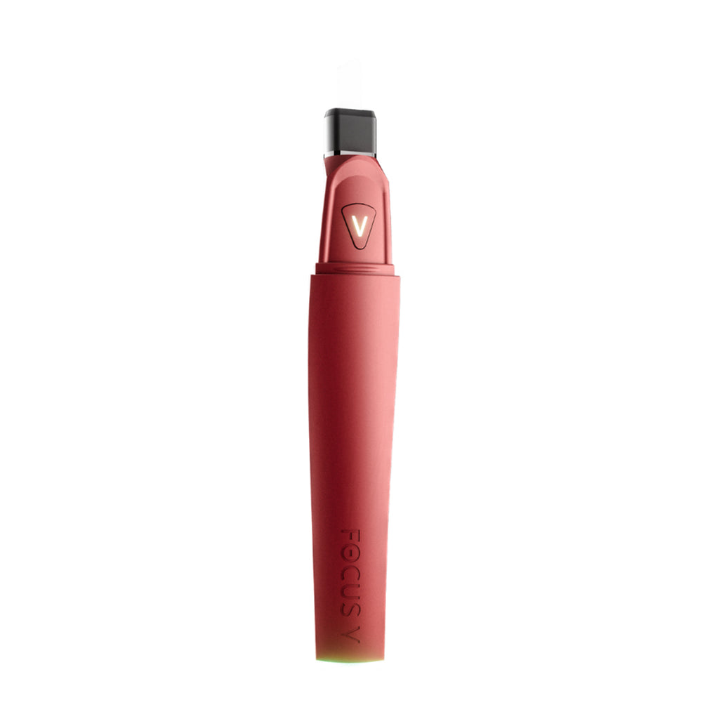 Focus V Saber electronic dabber with sleek mint green finish and advanced concentrate tool features.