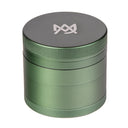 Four-piece MJ Arsenal aluminum grinder with kief catcher for smooth vaporizer sessions.
