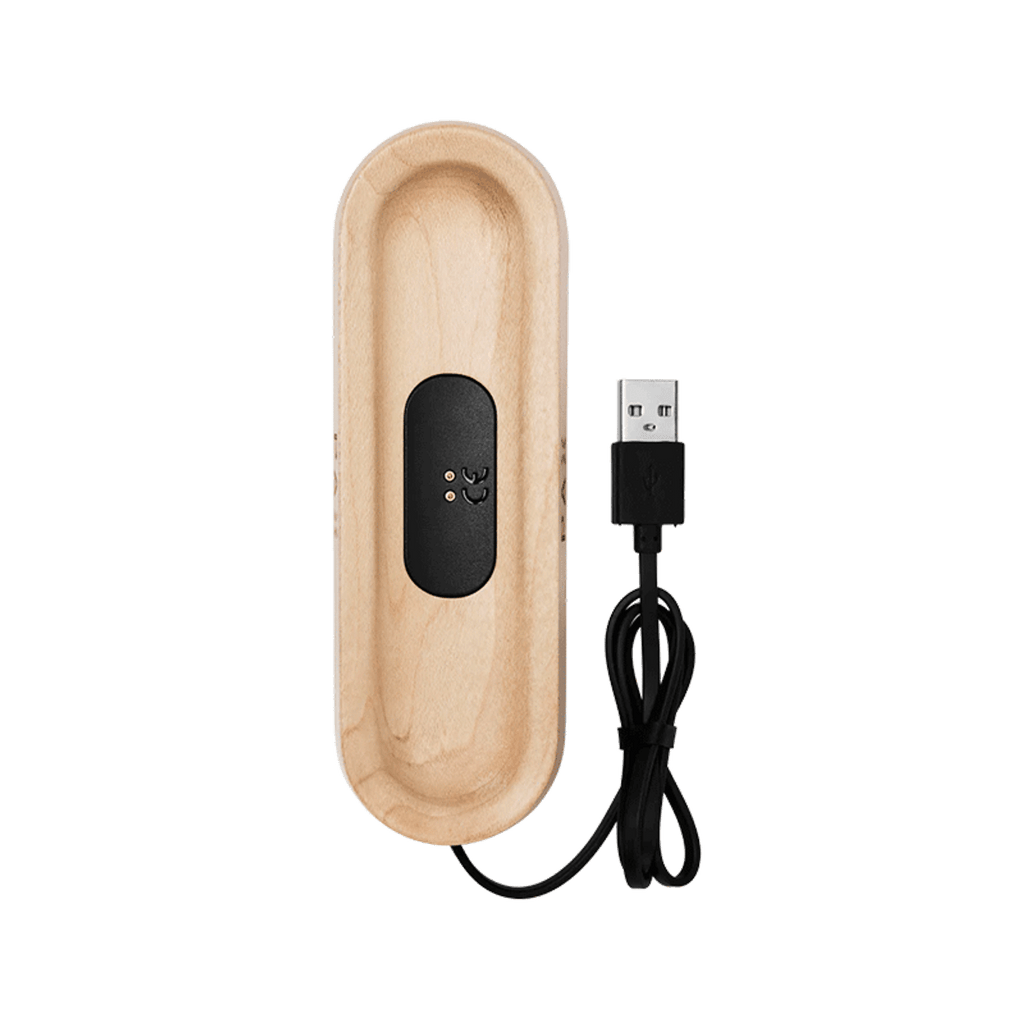 Premium wood charging dock with anti-slip design for PAX devices.
